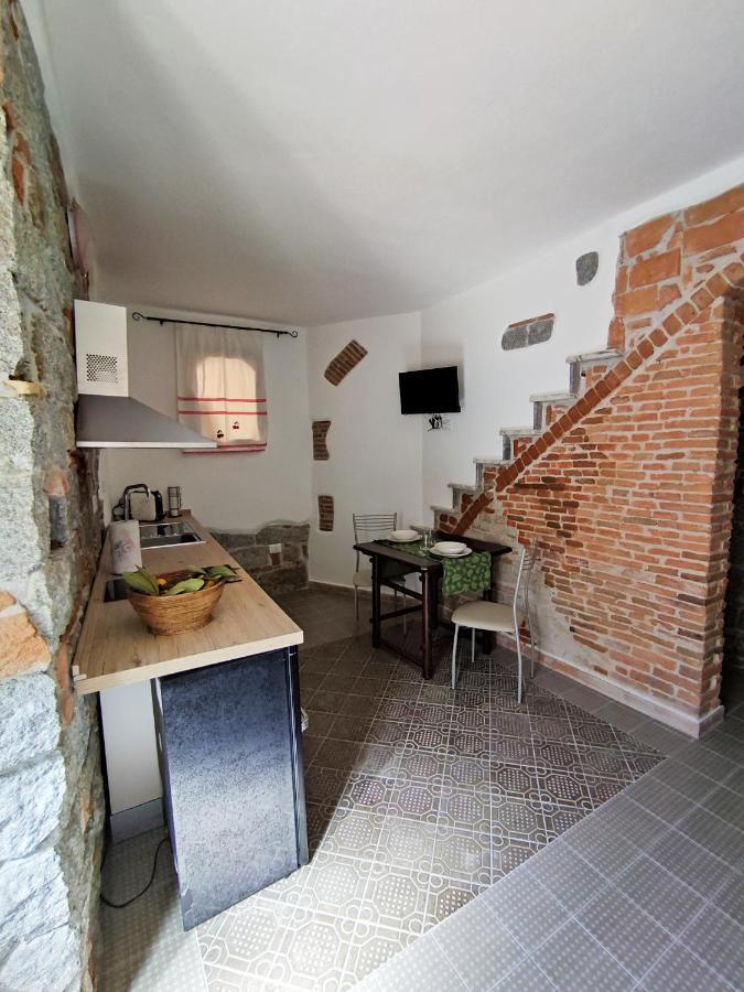 Su Skusorgiu Apartment ตอร์โตลี ภายนอก รูปภาพ