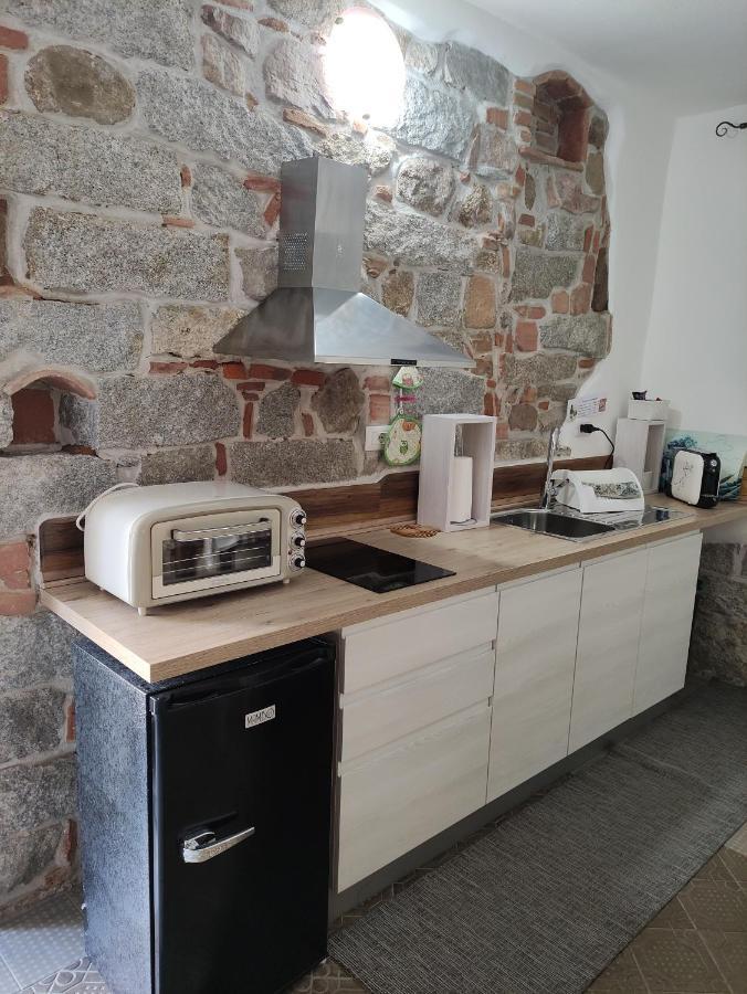 Su Skusorgiu Apartment ตอร์โตลี ภายนอก รูปภาพ